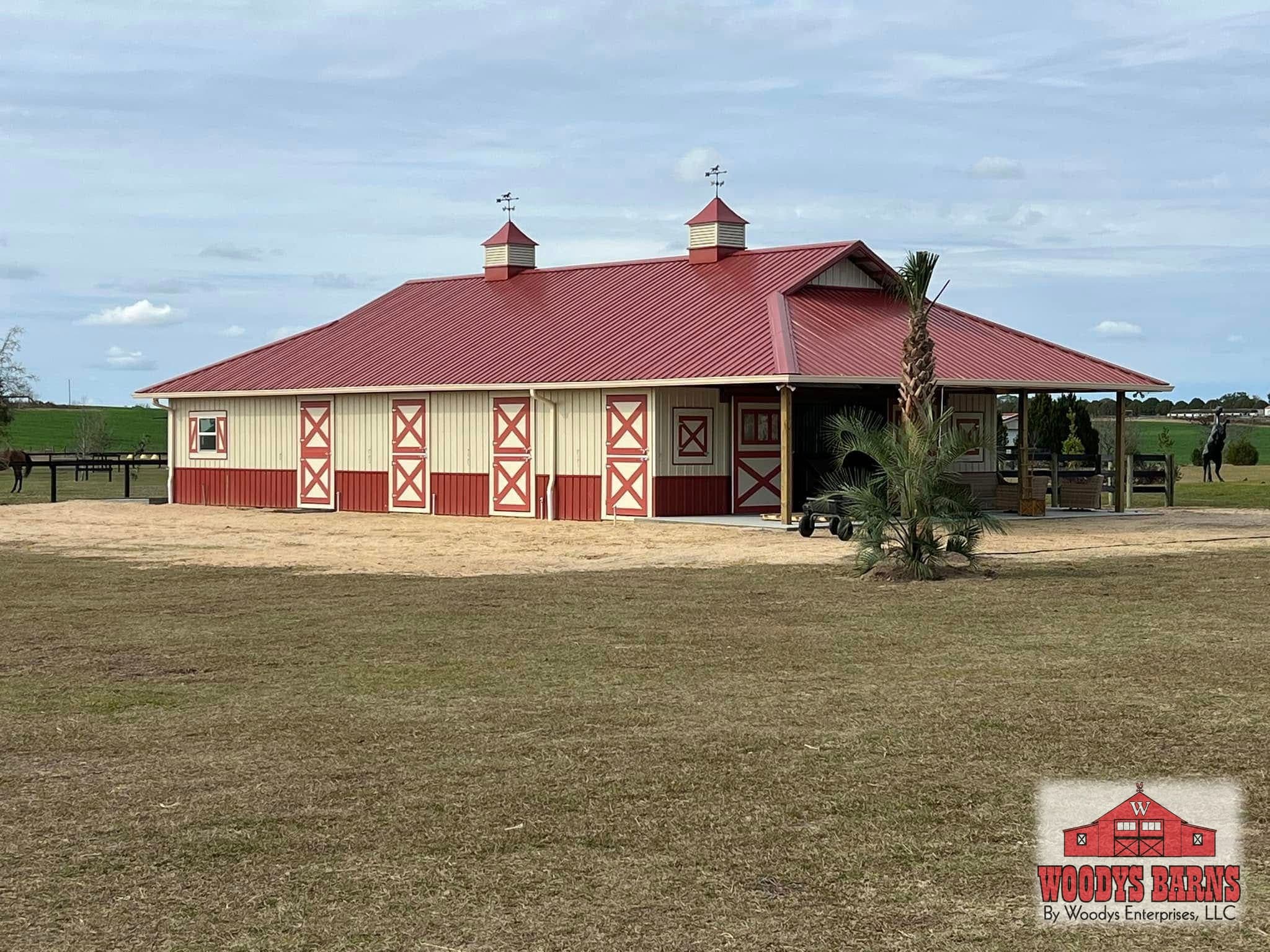 The Debuire Barn, a center aisle barn built by Woodys Barns in Florida